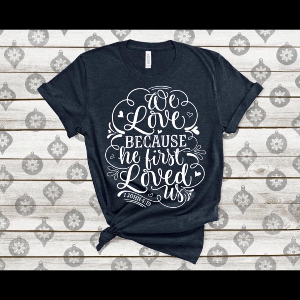 He 1st Loved Us Tee